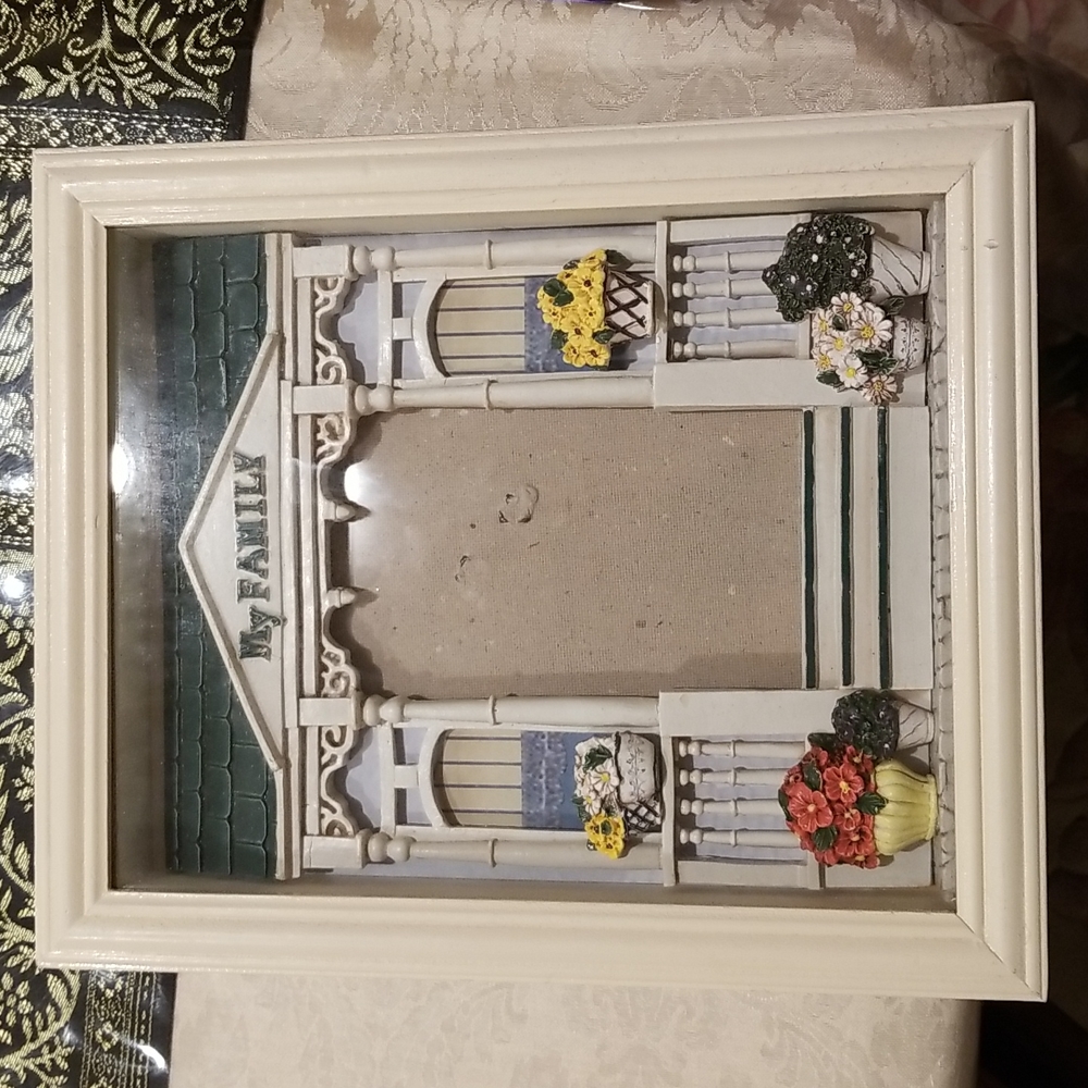 White wood frame approximately 11"x9"